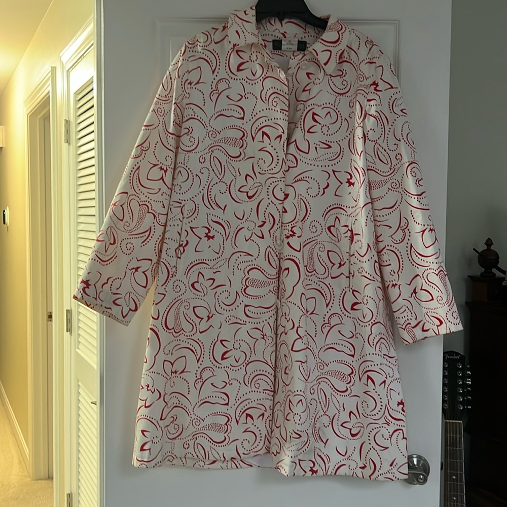 Like new.! Size 10 red and white rain coat